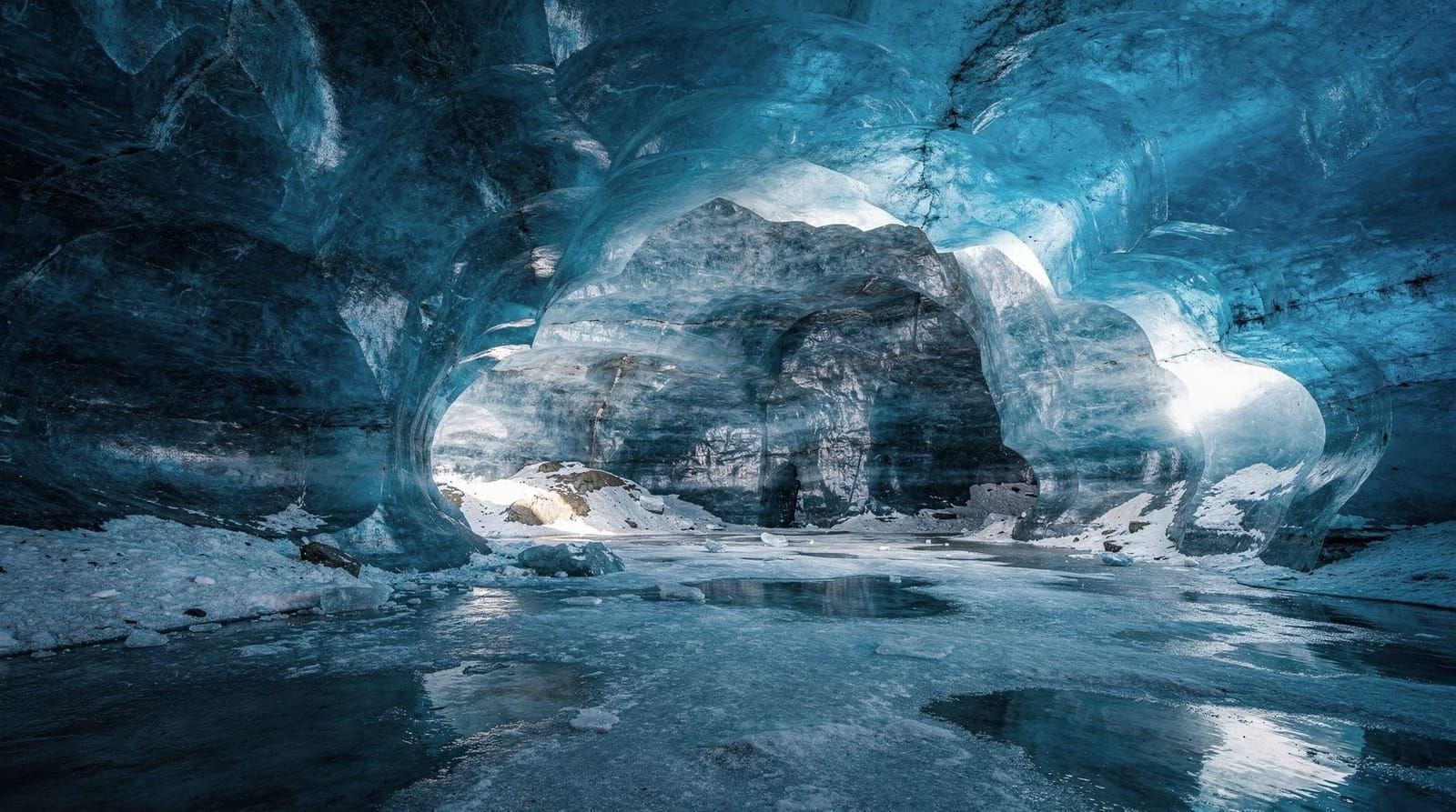 From Gullfoss: Langjökull Ice Cave and Snowmobile Tour